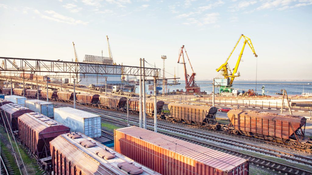 freight trains lined up at a seaport